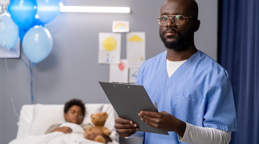 Doctor with medical card at hospital